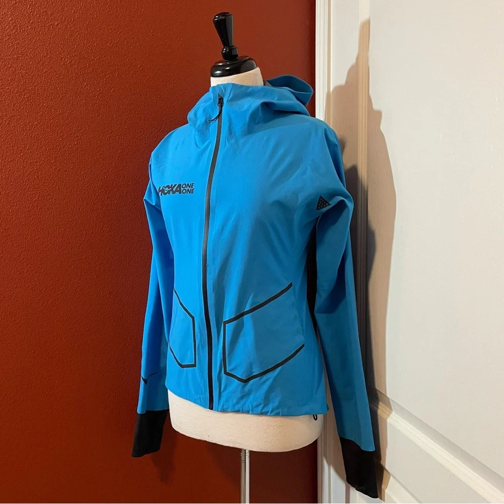 Hoka Women’s UGlow Performance Blue Athletic Time to Fly Runners Jacket